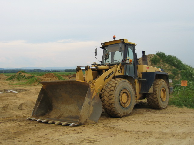 hanomag 80 e la culturista muscolosa esperta in spostamento colline Attachment