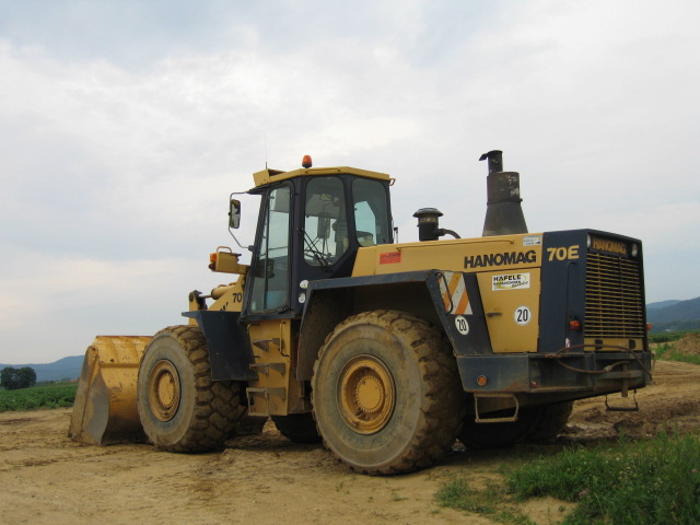 hanomag 80 e la culturista muscolosa esperta in spostamento colline Attachment