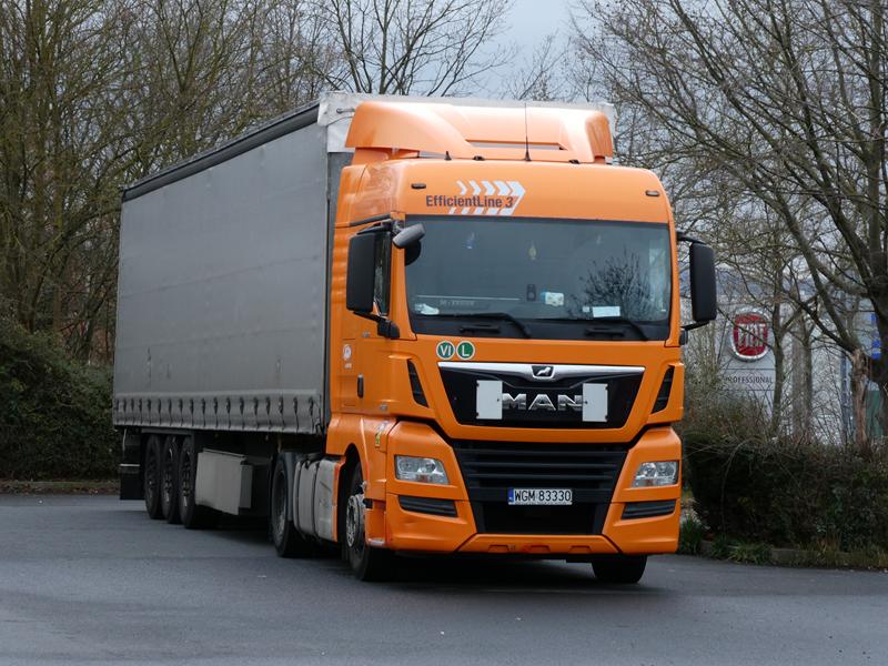 MAN TGX 18.500 E6 SZM Orange Polen 8 (Copy).jpg