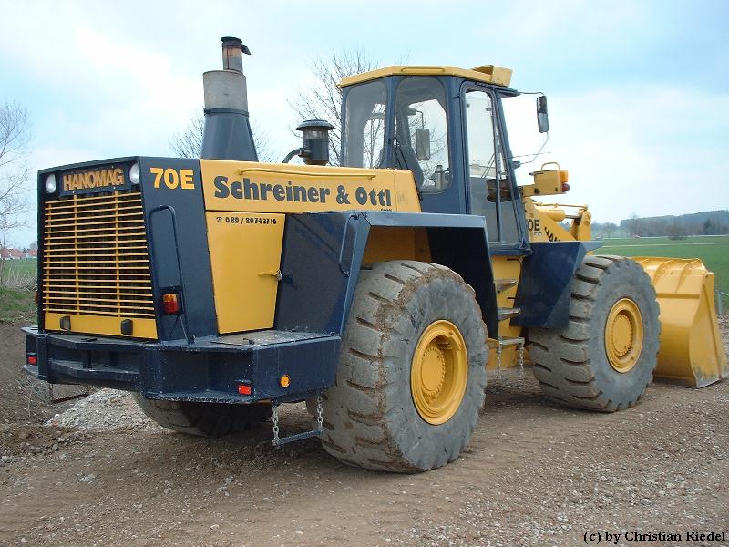 hanomag 80 e la culturista muscolosa esperta in spostamento colline Attachment