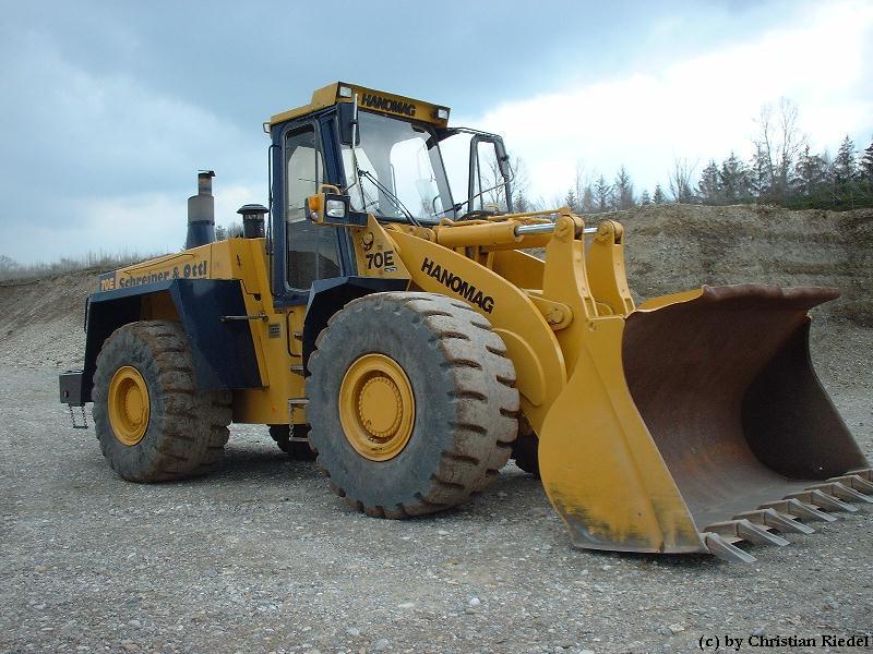 hanomag 80 e la culturista muscolosa esperta in spostamento colline Attachment